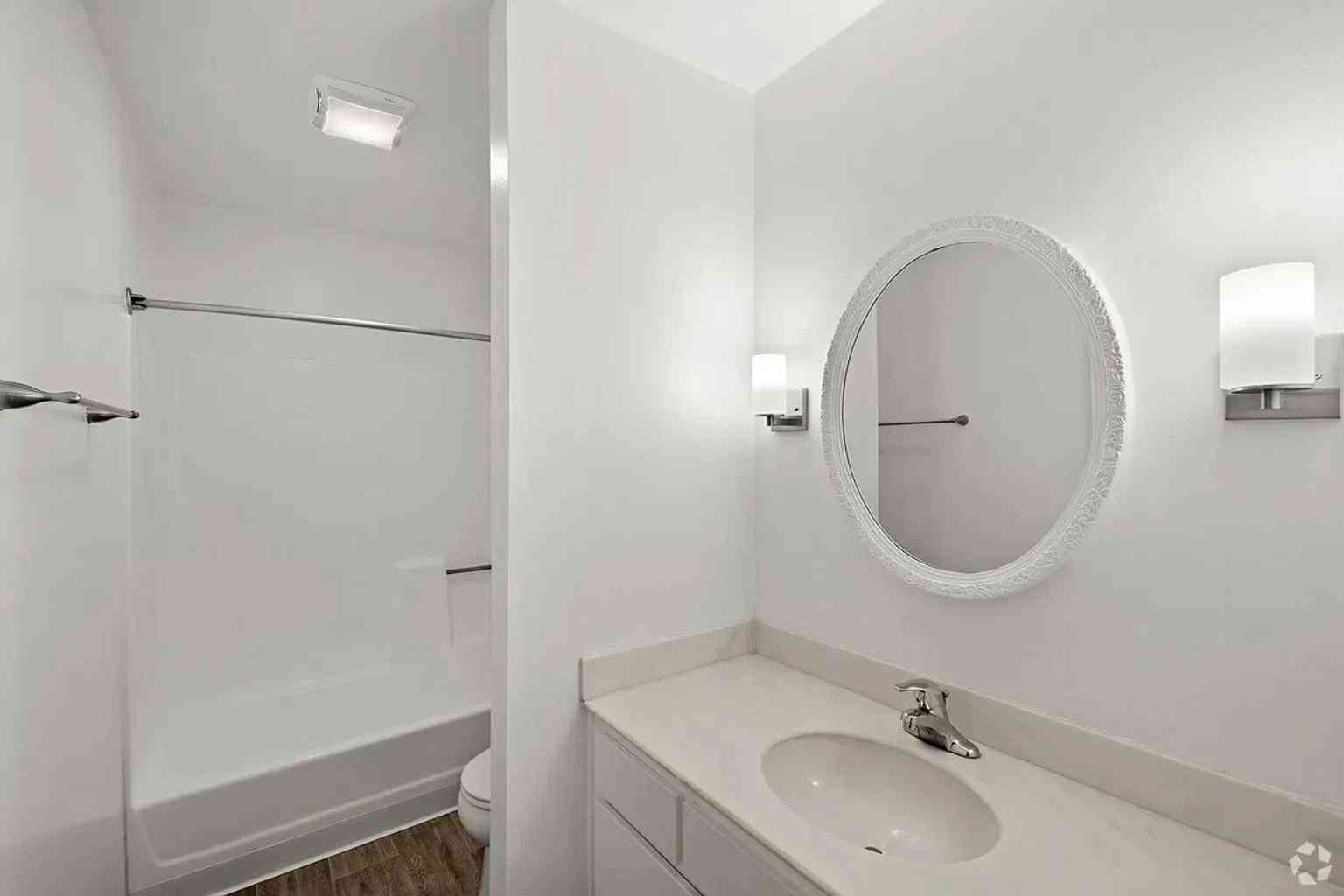 bathroom white vanity decorative circular mirror