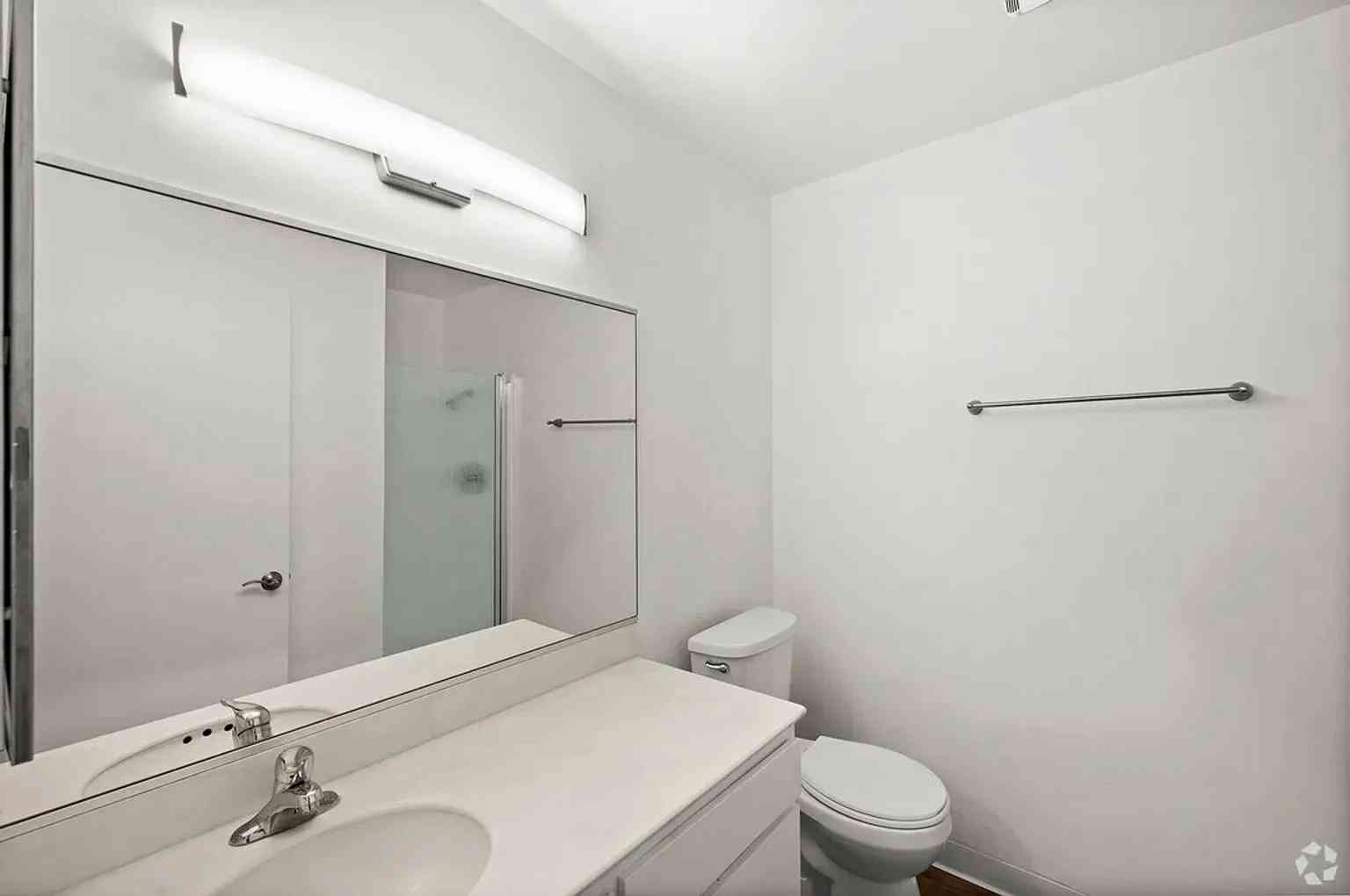 clean modern bathroom sink area toilet