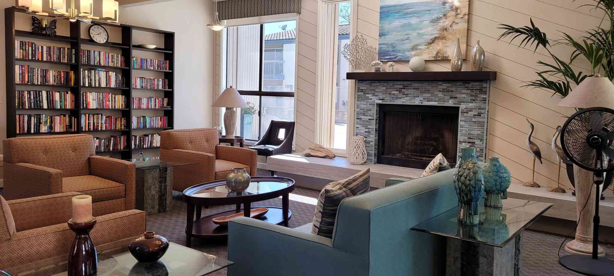 ashwood community clubhouse with bookshelves and seating
